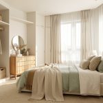 Aménagement chambre sommeil : 7 éléments à penser ensemble Chambre lumineuse et apaisante au style contemporain naturel, avec rangements discrets, textiles doux, mobilier en bois clair et lumière matinale.